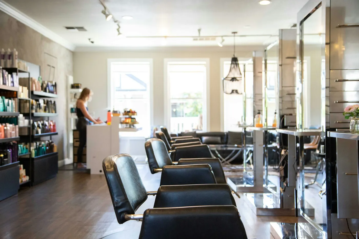 A styling area with chairs and mirrors
